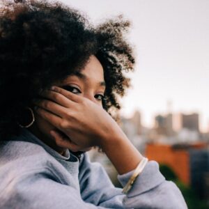 woman in gray sweater