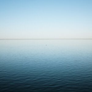 calm sea under blue sky