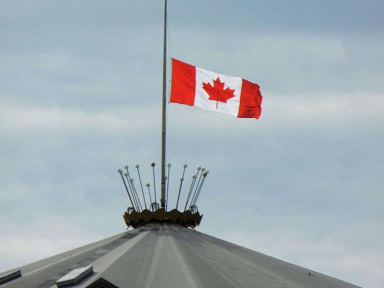 City Flags Lowered in Memory of 215 Children