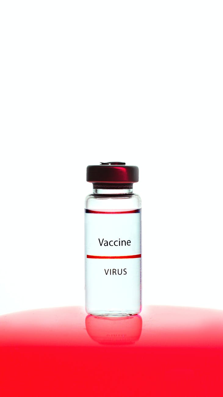 a vaccine vial on white background