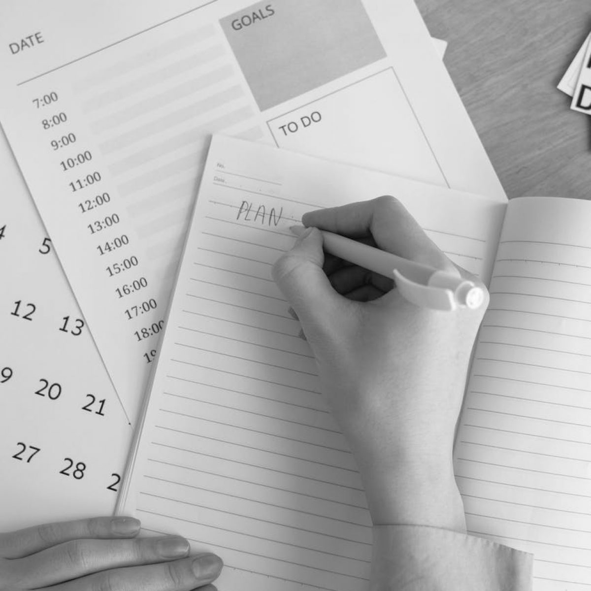 hand writing on notepad