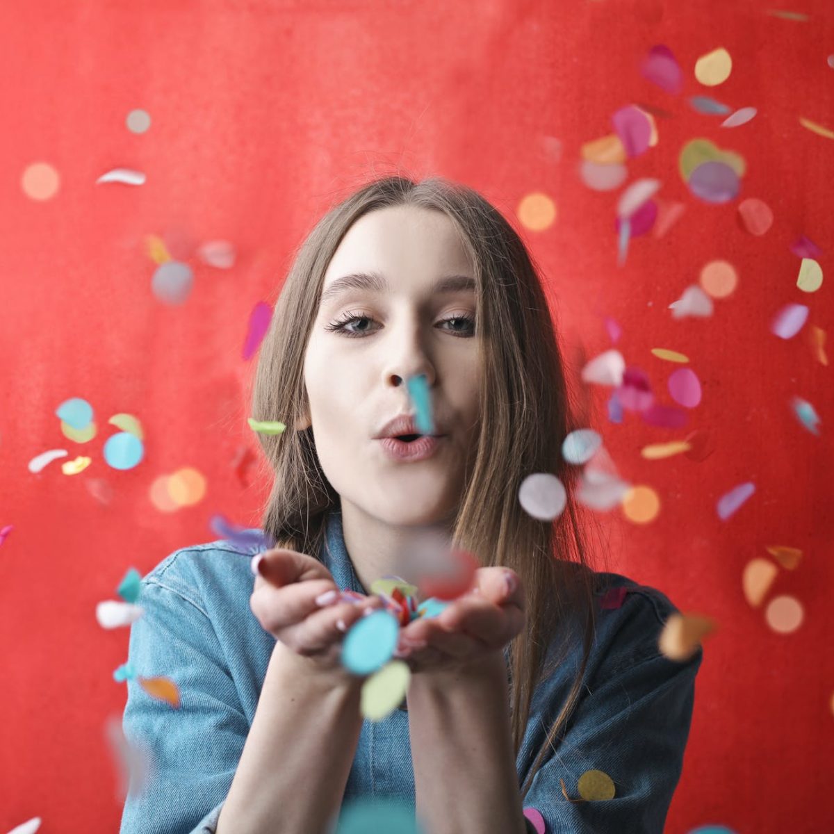 woman in blue long sleeve shirt