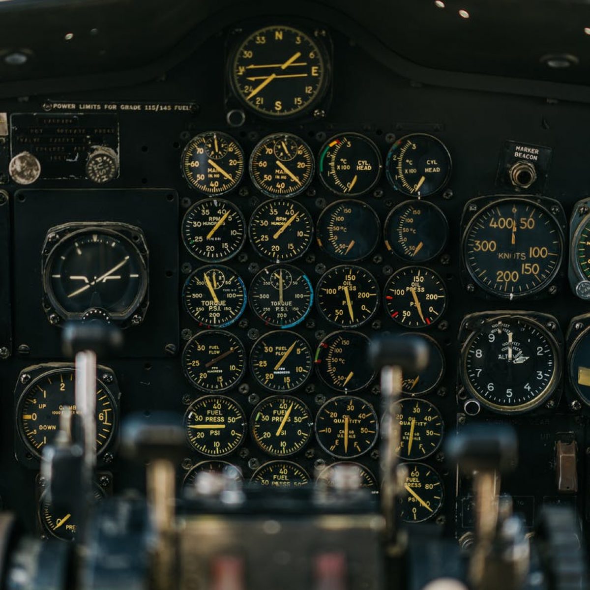 panel with gauges in cockpit of airplane