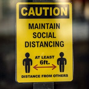 yellow and black caution wet floor sign