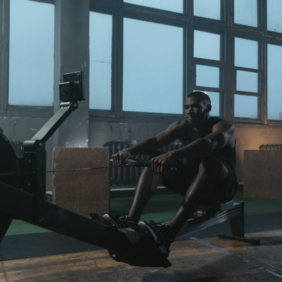 a man using a rowing machine