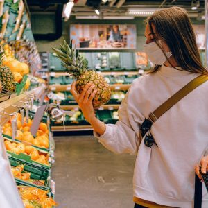 woman wearing mask in supermarket