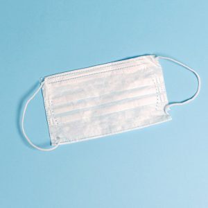 face mask on blue background