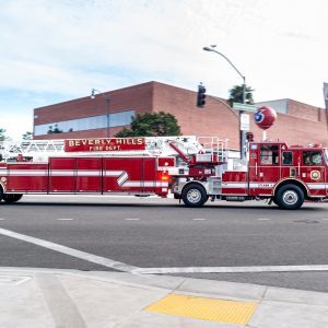 red and white fire truck on road - stock photo