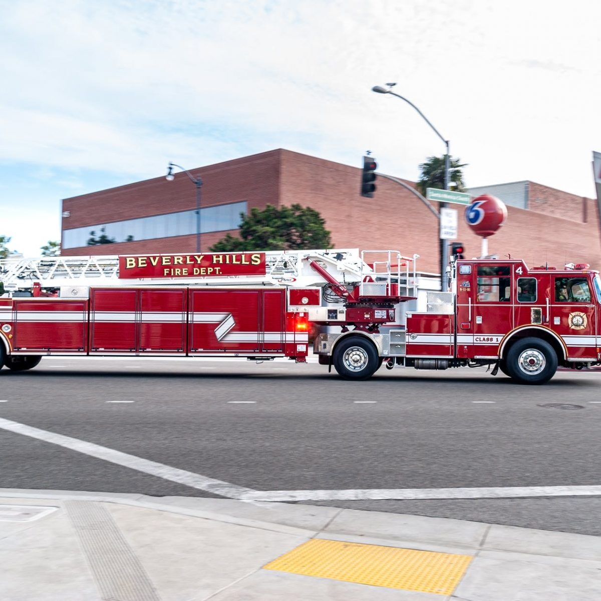 red and white fire truck on road - stock photo