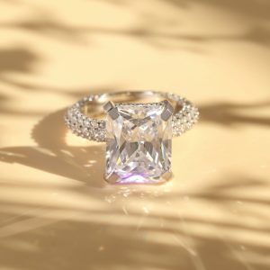 diamond ring on yellow surface