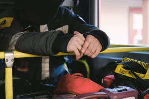 firefighter inside of a fire truck