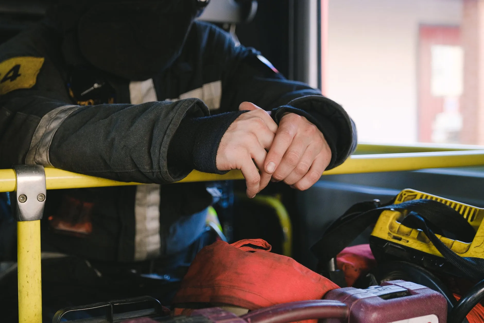 firefighter inside of a fire truck