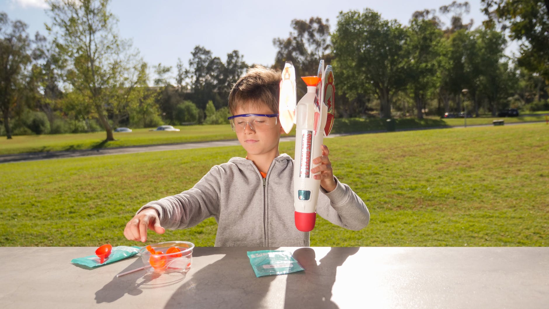 a boy playing a rocket