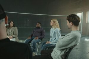 People Attending a Group Therapy Meeting