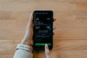 person holding black samsung android smartphone