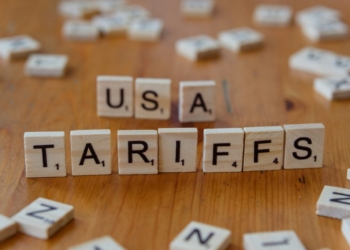 A close up of scrabble tiles spelling the word usa, tarifs