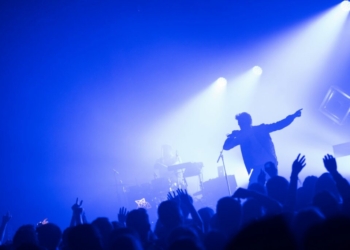 man standing in front of people